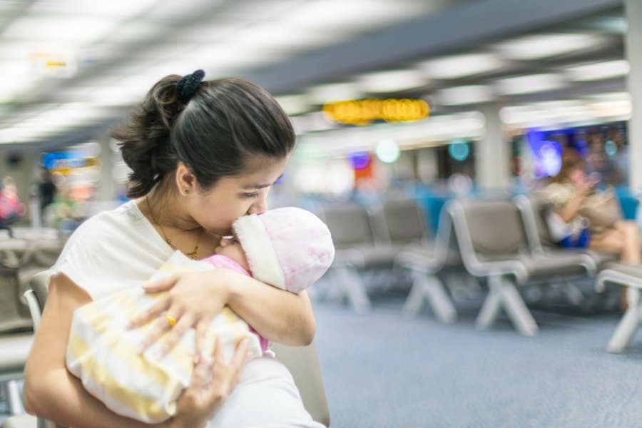 flying with baby prevent ear pain - 6 Secrets To Stress-Free Travel With Baby