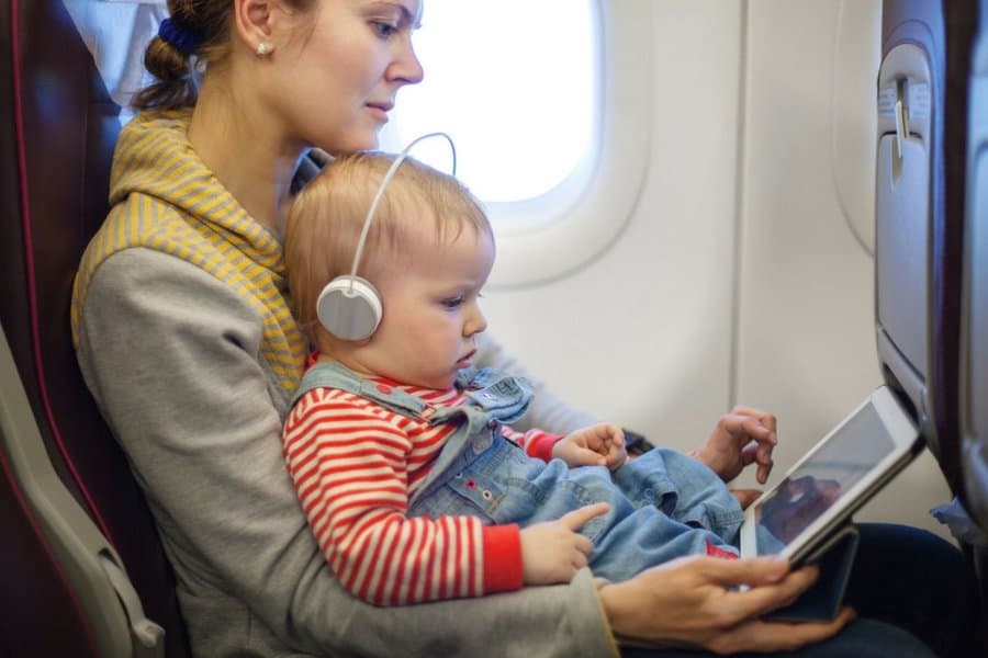 flying with baby bring entertainment - 6 Secrets To Stress-Free Travel With Baby