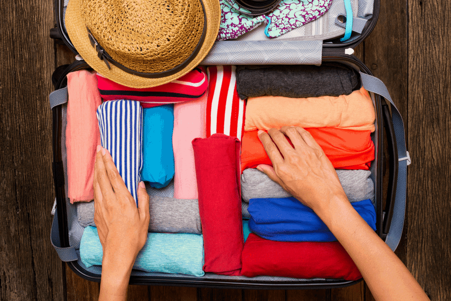 roll it up - 10 Packing and Traveling Tips Every Woman Should Know